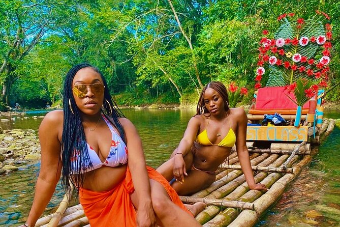 Private Montego Bay Bamboo Rafting with Limestone Foot Massage - Your certified raft captain: history talk, music, and great photos