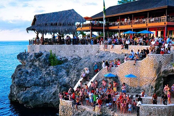 Private Seven Mile Beach and Rick’s Café Tour From Negril Hotels - Rick’s Café at sunset: reggae, views, and the cliffside show