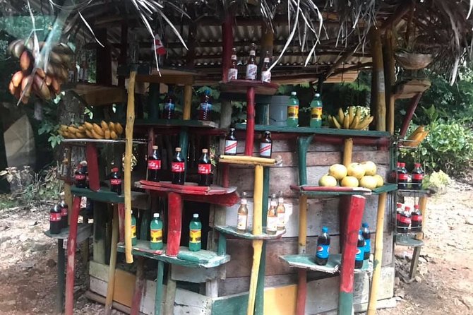 Private Tour of Bob Marley House from Ocho Rios - The hilltop childhood home: bed, furniture, and a meditation rock
