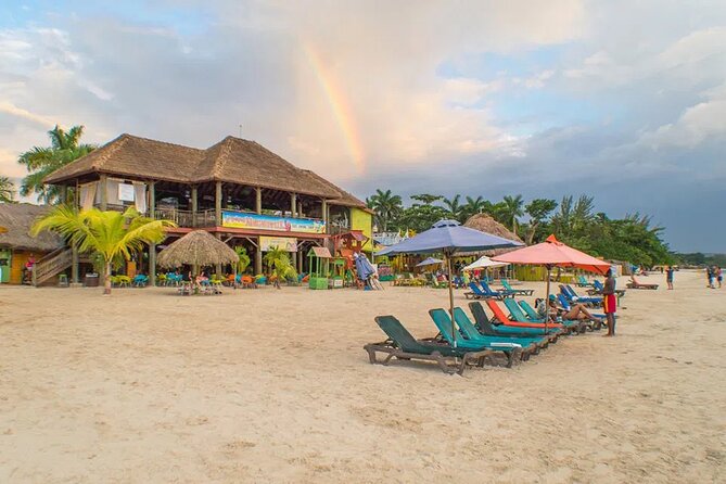 Private Tour of Negril Beach and Sunset at Ricks Cafe - Margaritaville Negril on 7 Mile Beach: Swim, Photos, and Trampoline Time