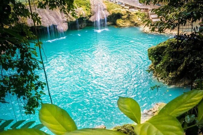 Private Tour to Dunns River and Blue Hole from Montego Bay - Dunn’s River Falls: climbing limestone tiers and earning the views