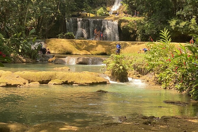 Private YS Falls and Zipline Tour from Montego Bay - Hip Strip craft market stop for real Jamaica souvenirs