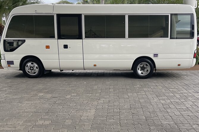 Sandals South Coast Private Transfer (White House) - Round-trip perks: beer, water, and that first vacation sip
