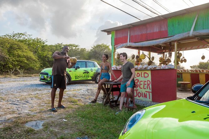 Self-Driven MINI Cooper Tour From Montego Bay To Negril - Rick’s Cafe: the show, the views, and the “stay or go” choice