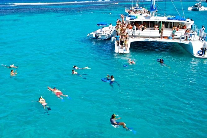 Shared Dunn's River Falls Snorkel Cruise with Music, Open Bar from Runaway Bay - On Board Vibe: Music, Open Bar, and the Beef Patty Setup