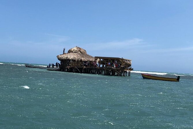 Tour to Black River and YS Falls - Stop 3, Floyd’s Pelican Bar: A Short Boat Ride to the Middle of the Ocean
